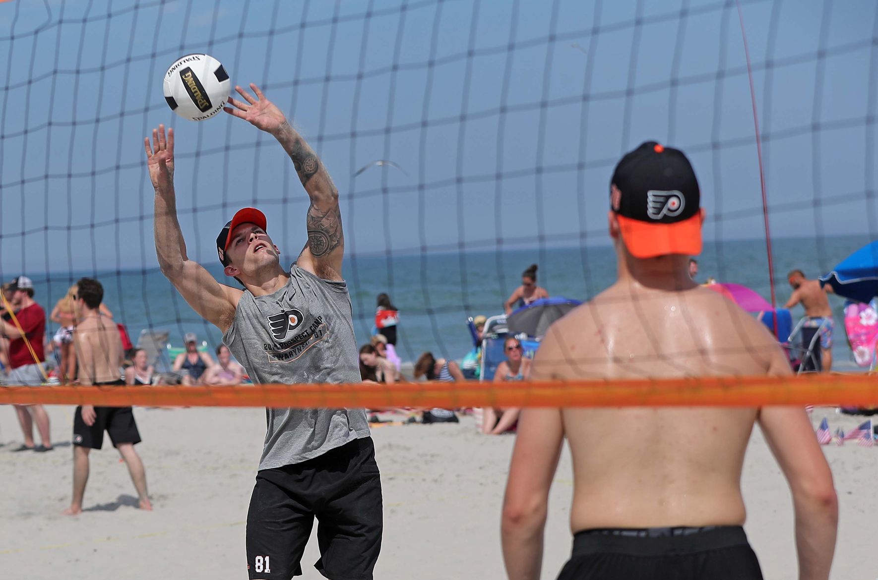 Philadelphia Flyers prospects sign autographs and play volleyball